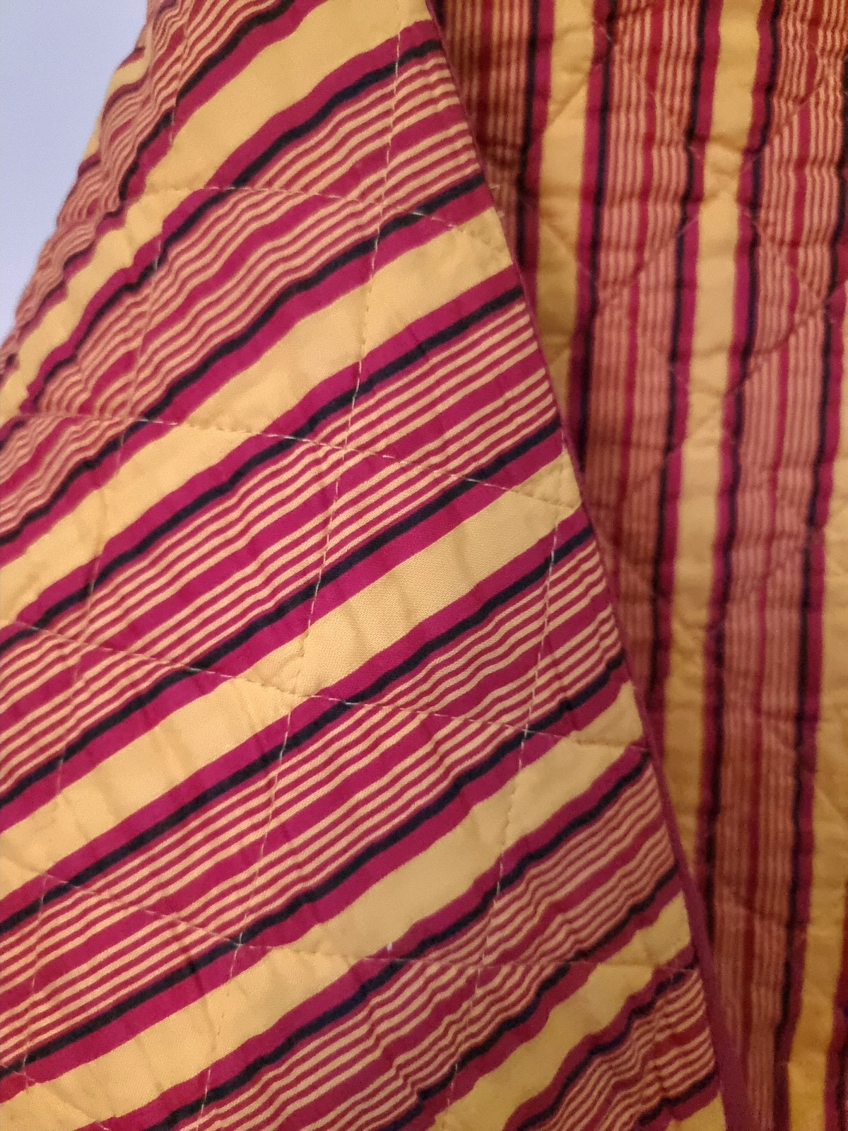 Veste matelassée jaune fleuri