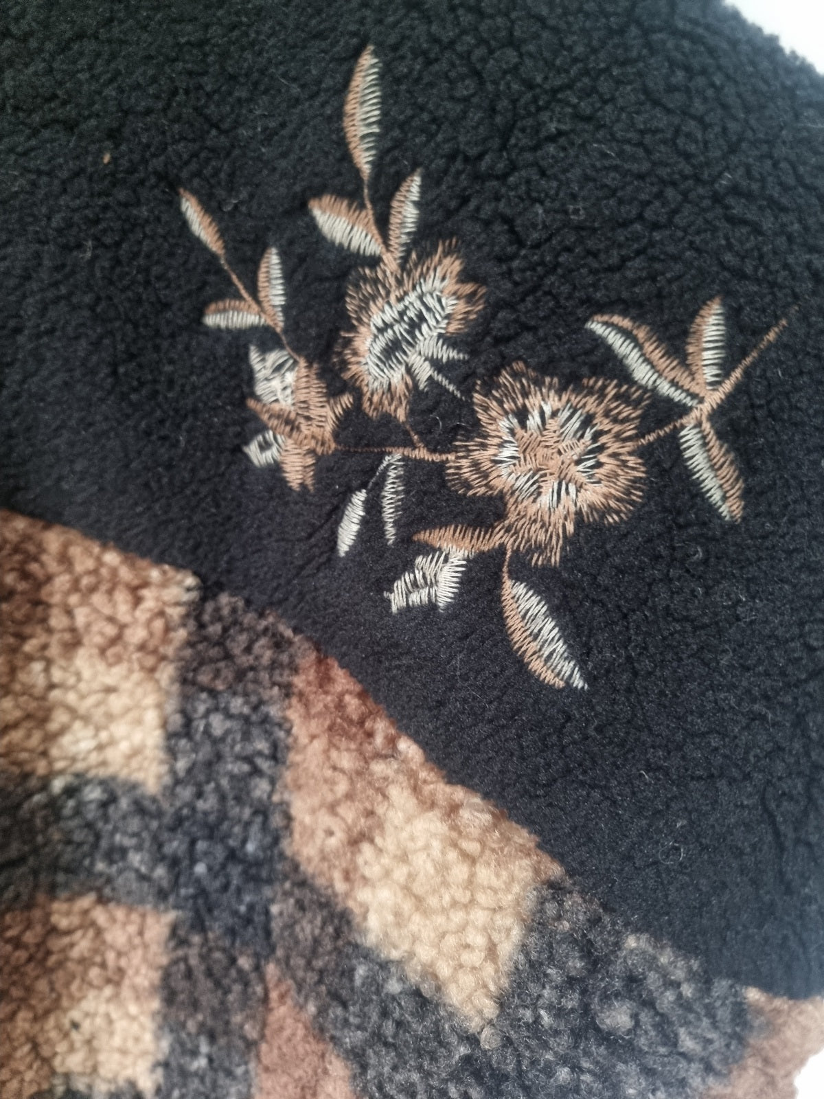 Veste sans manches carreaux noir et camel