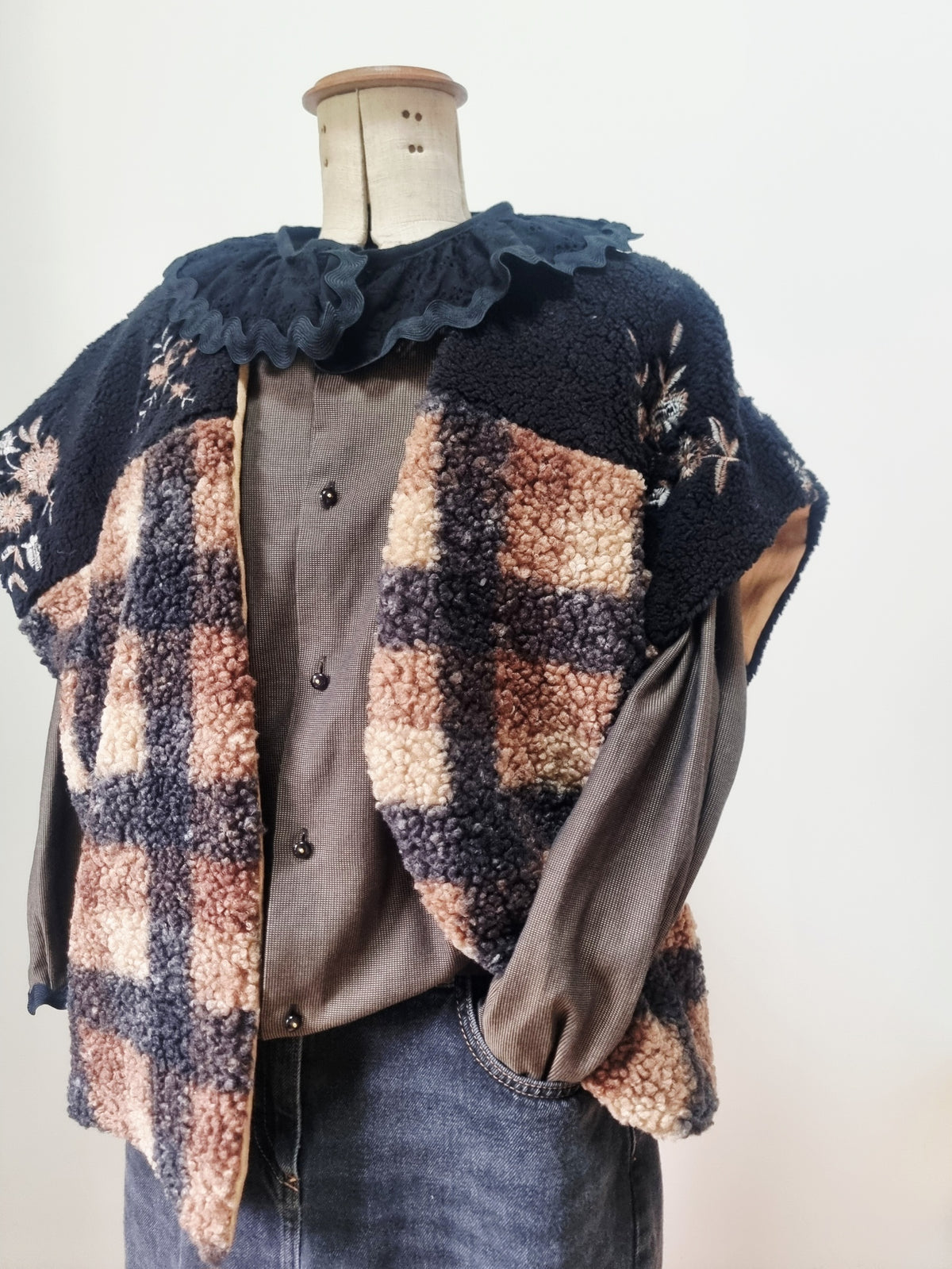 Veste sans manches carreaux noir et camel