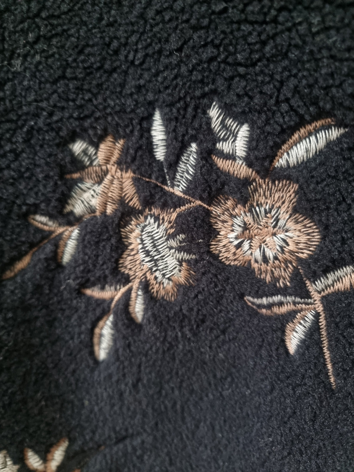 Veste sans manches carreaux noir et camel