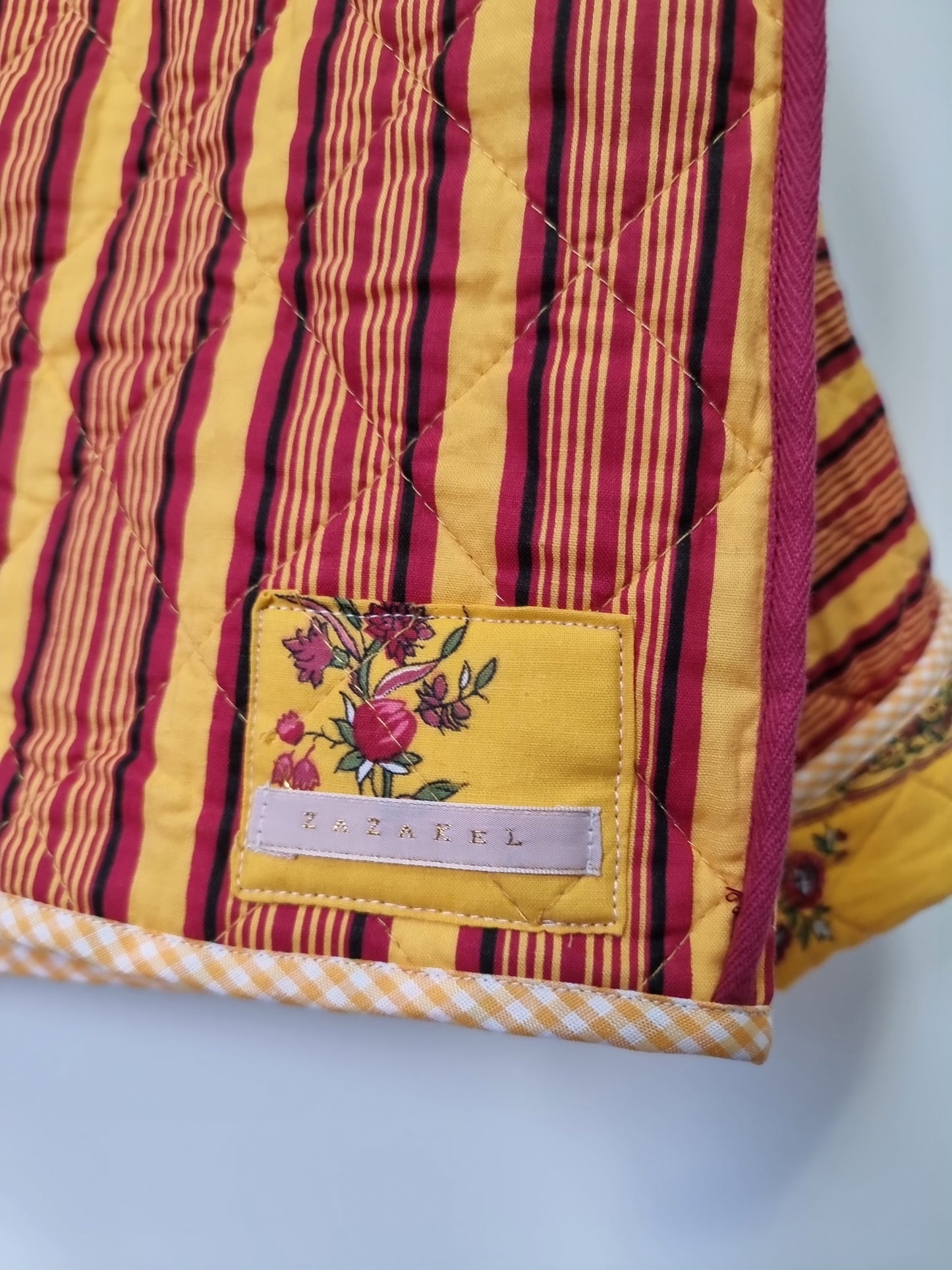 Veste matelassée jaune fleuri